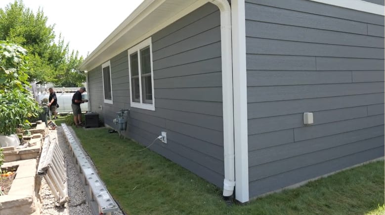 LP SmartSide Siding in Cavern Steel with White Soffit and Fascia