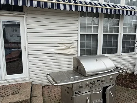 Melted Vinyl Siding Repair Case Study