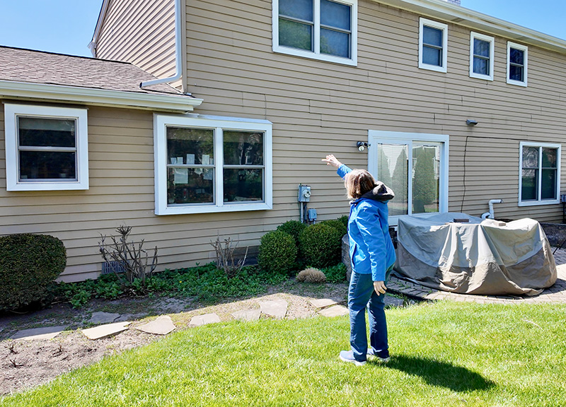 Palatine Homeowner Pointing Out Problems with Gutters