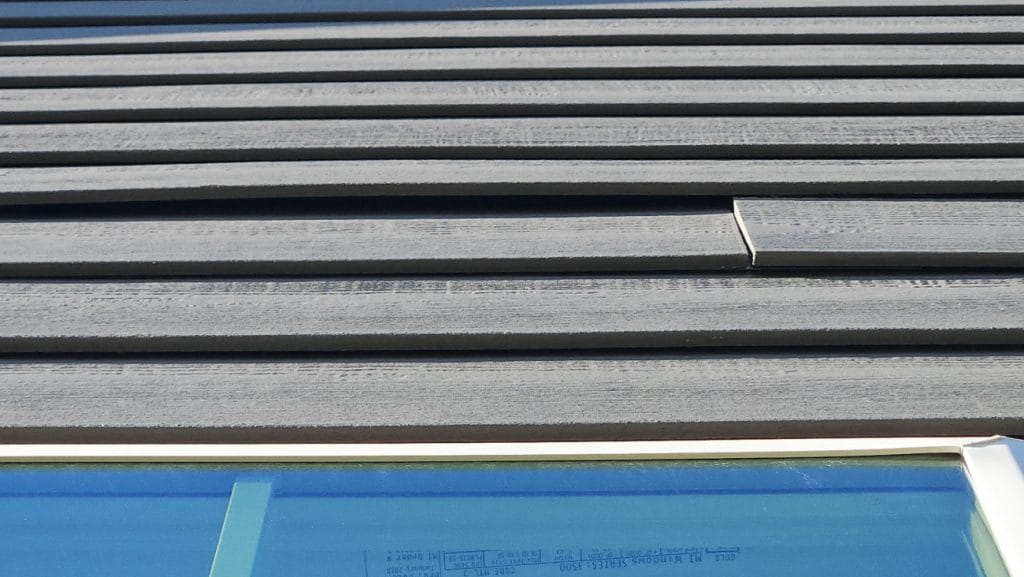 Side Wall with Visible Gaps Between Siding Panels