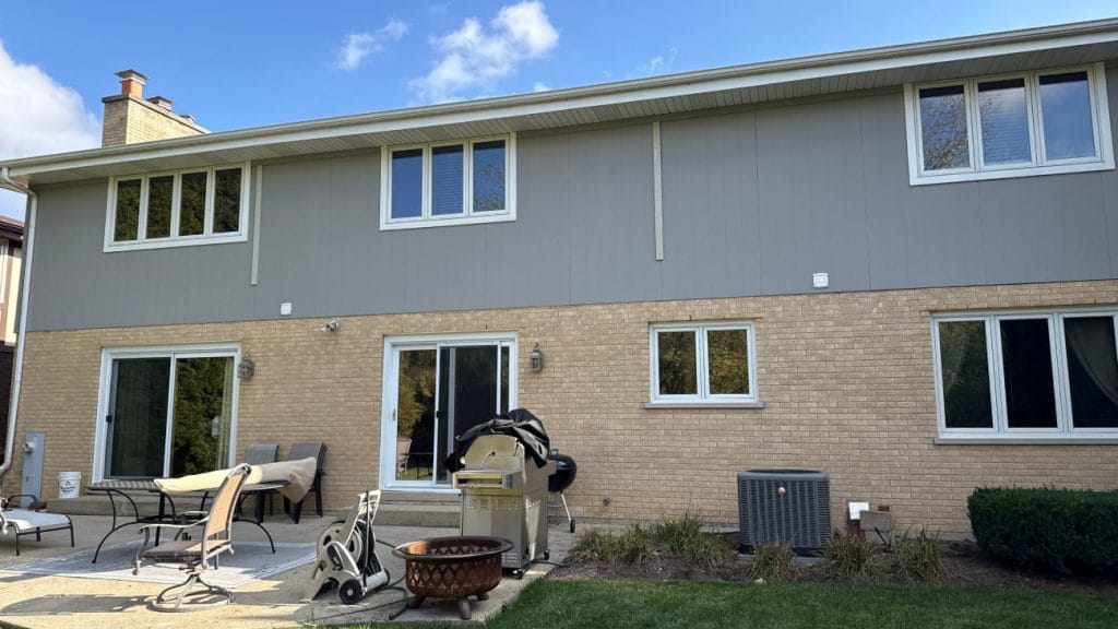 White Boards Nailed Over Siding